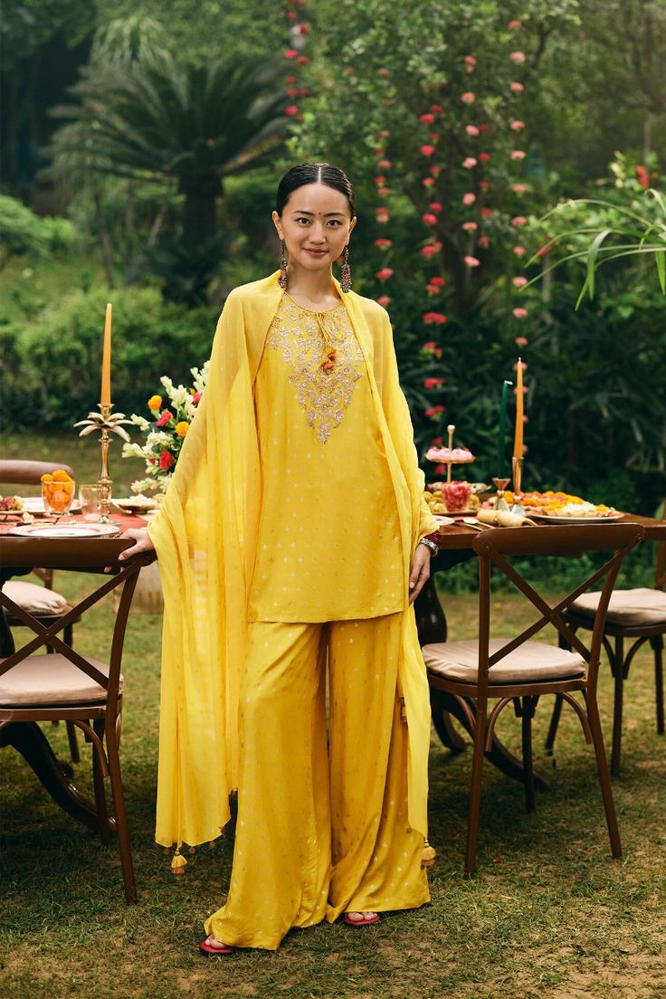 Bright marigold kurta with flared palazzos and dupatta